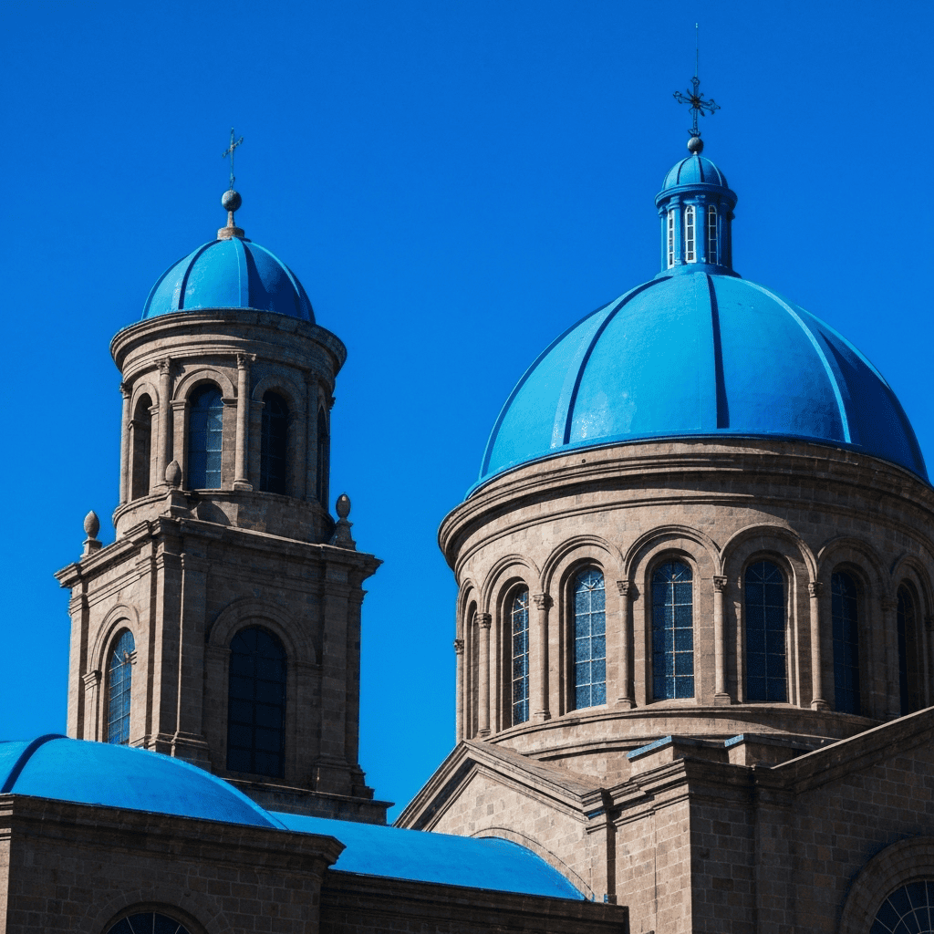 Vibrant image of Cuenca's blue-domed cathedral.